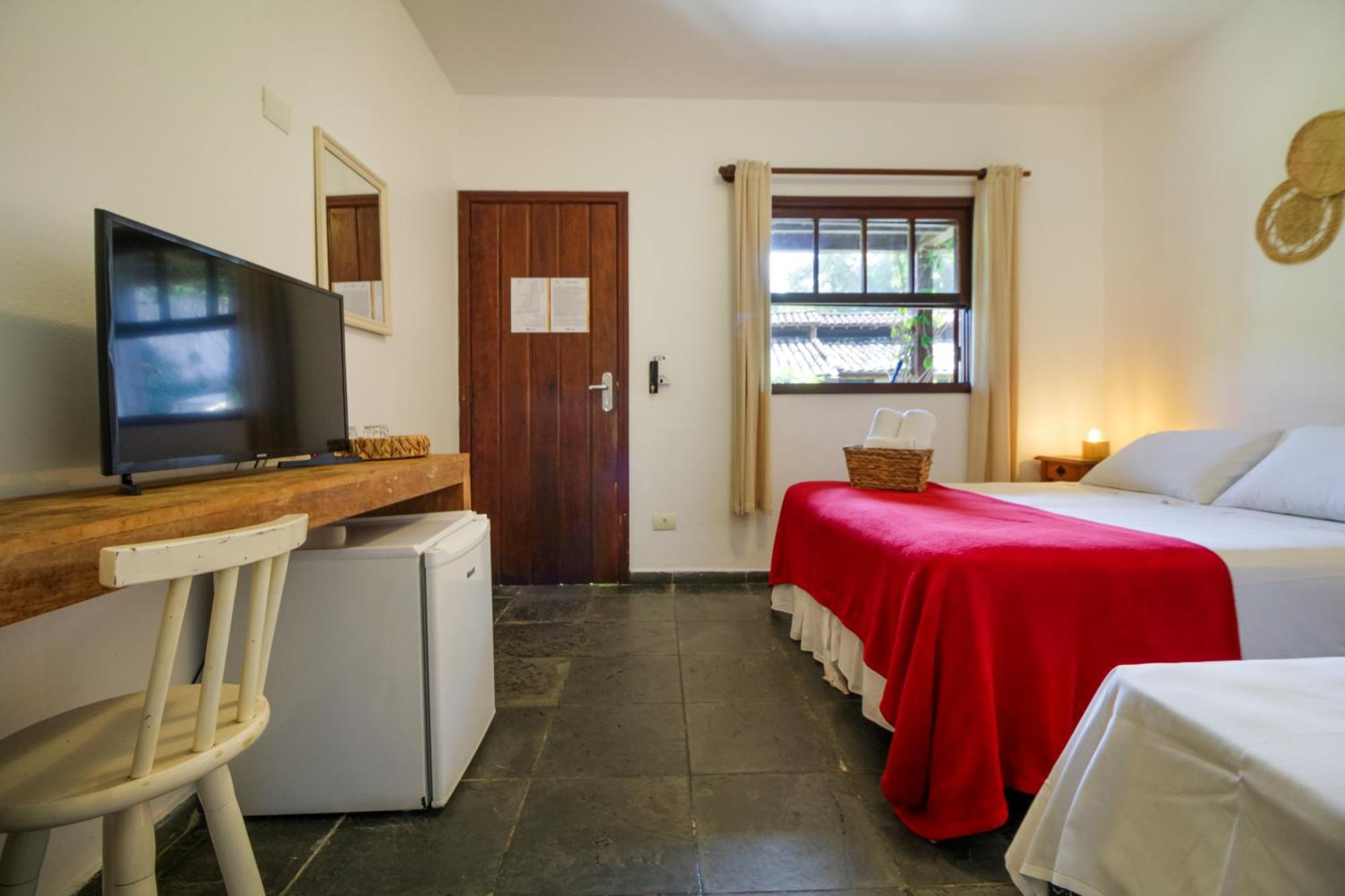 Velinn Caravela Pousada Ilhabela Habitación foto